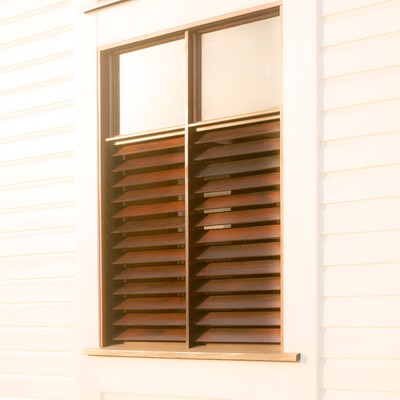 Mahogany Bay Village's tropical windows are built of sturdy mahogany louvers with glass transoms above