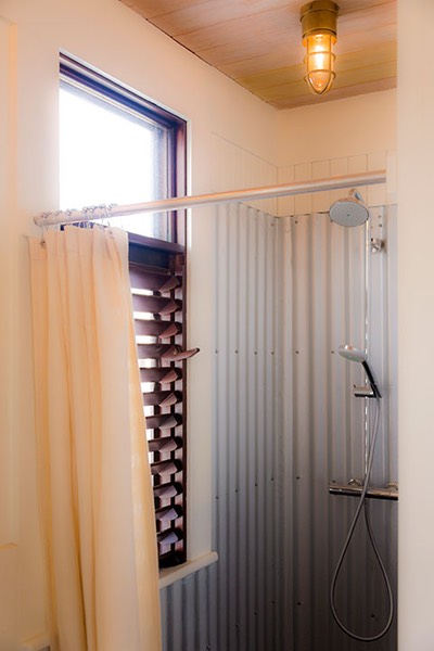 louvered mahogany window lets you shower in a tropical breeze - one of life's simple pleasures