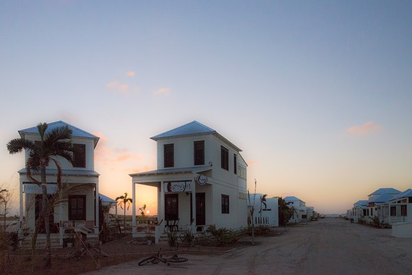 Rum & Bean front porch frames the setting sun at Mahogany Bay Village on Ambergris Caye in Belize